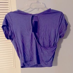 Large, halter top with middle opening